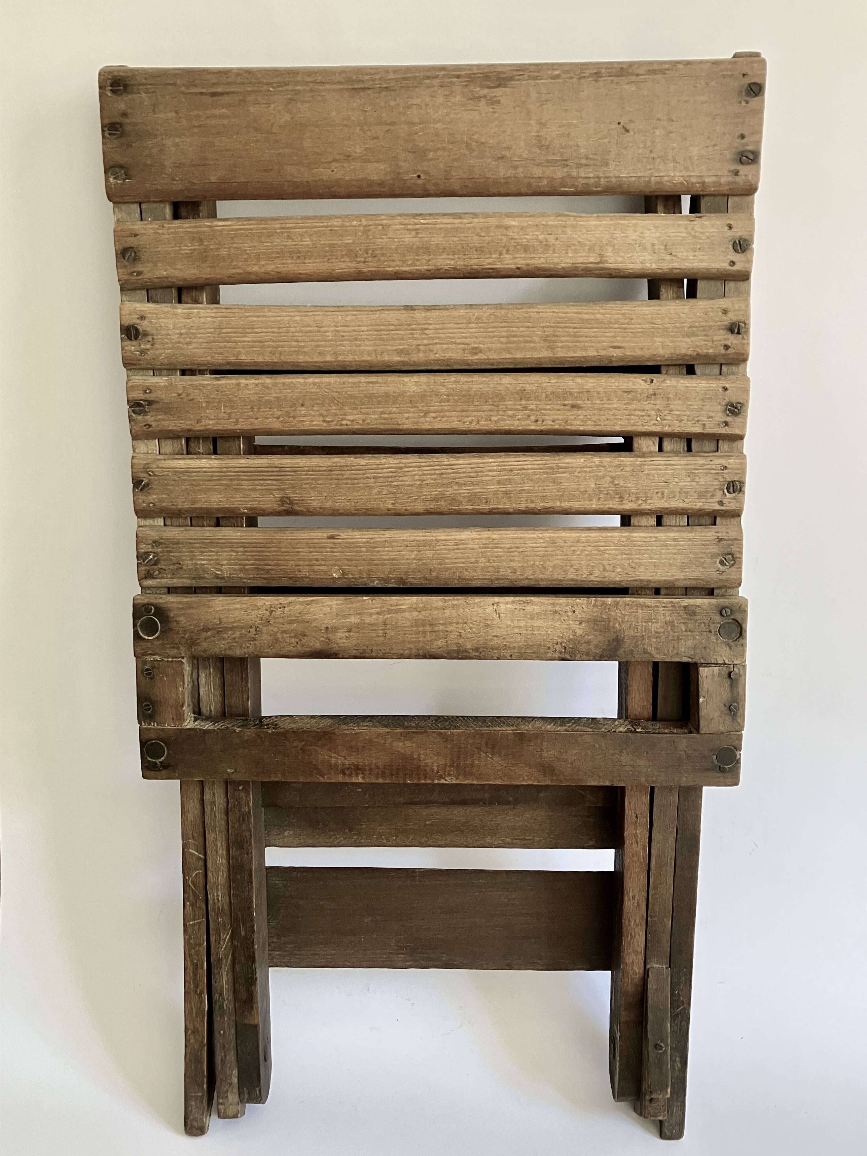 Ancienne chaise pliante avec dossier