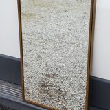 Mirror of the 70s in gilded metal, 60x35 cm