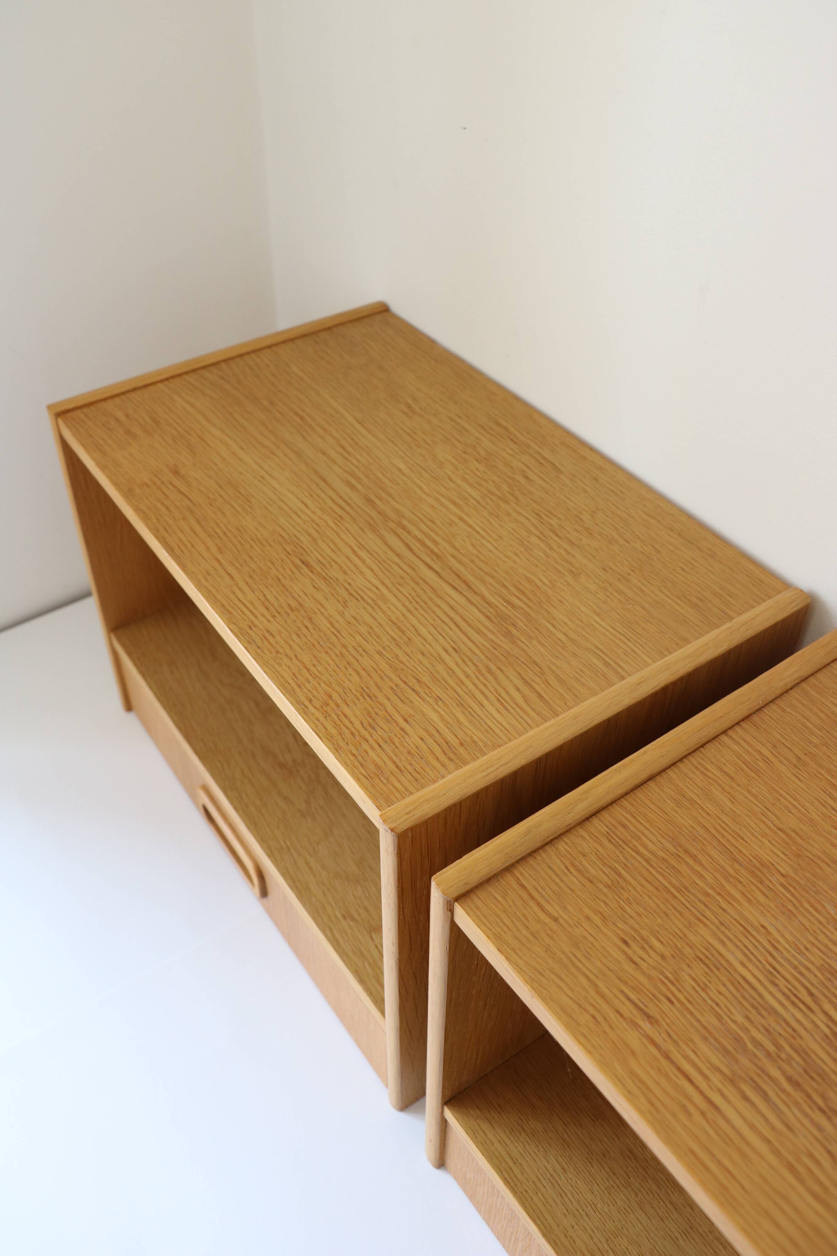 2 wall-mounted Scandinavian bedside tables with drawers, oak, 1960.