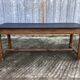 Antique oak farmhouse table with cat bar and 2 end drawers