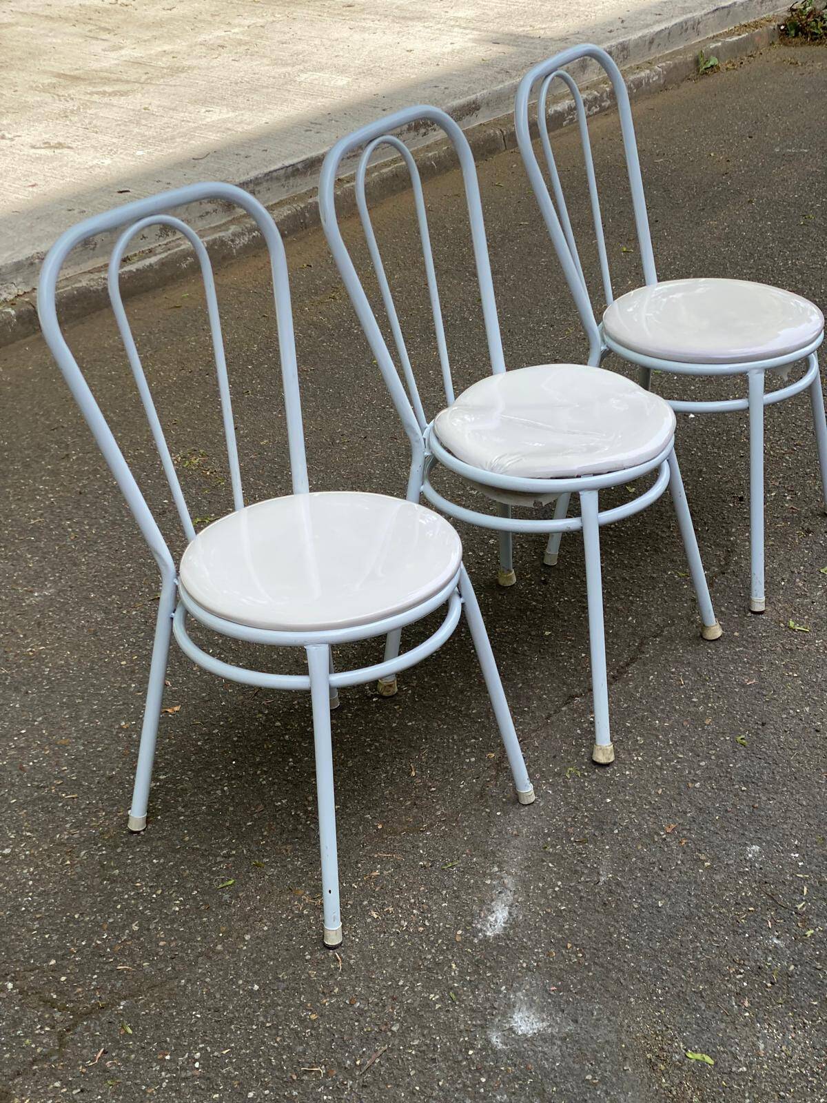 3 white steel and beige leather bistro chairs