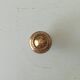 Vintage furniture knob in gilded brass