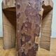 Brutalist solid wood coffee table carved from a room in a plane tree trunk