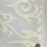Polished and screen-printed glass sconce by eglo
