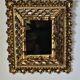 Vintage ethnic mirror, handcrafted golden wood, 1950.