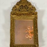 Miroir régence en bois sculpté doré début XVIIIème siècle