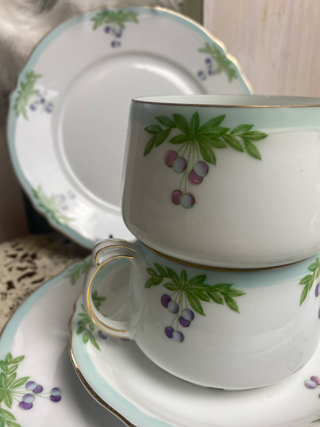 Set of 2 antique porcelain chocolate services.