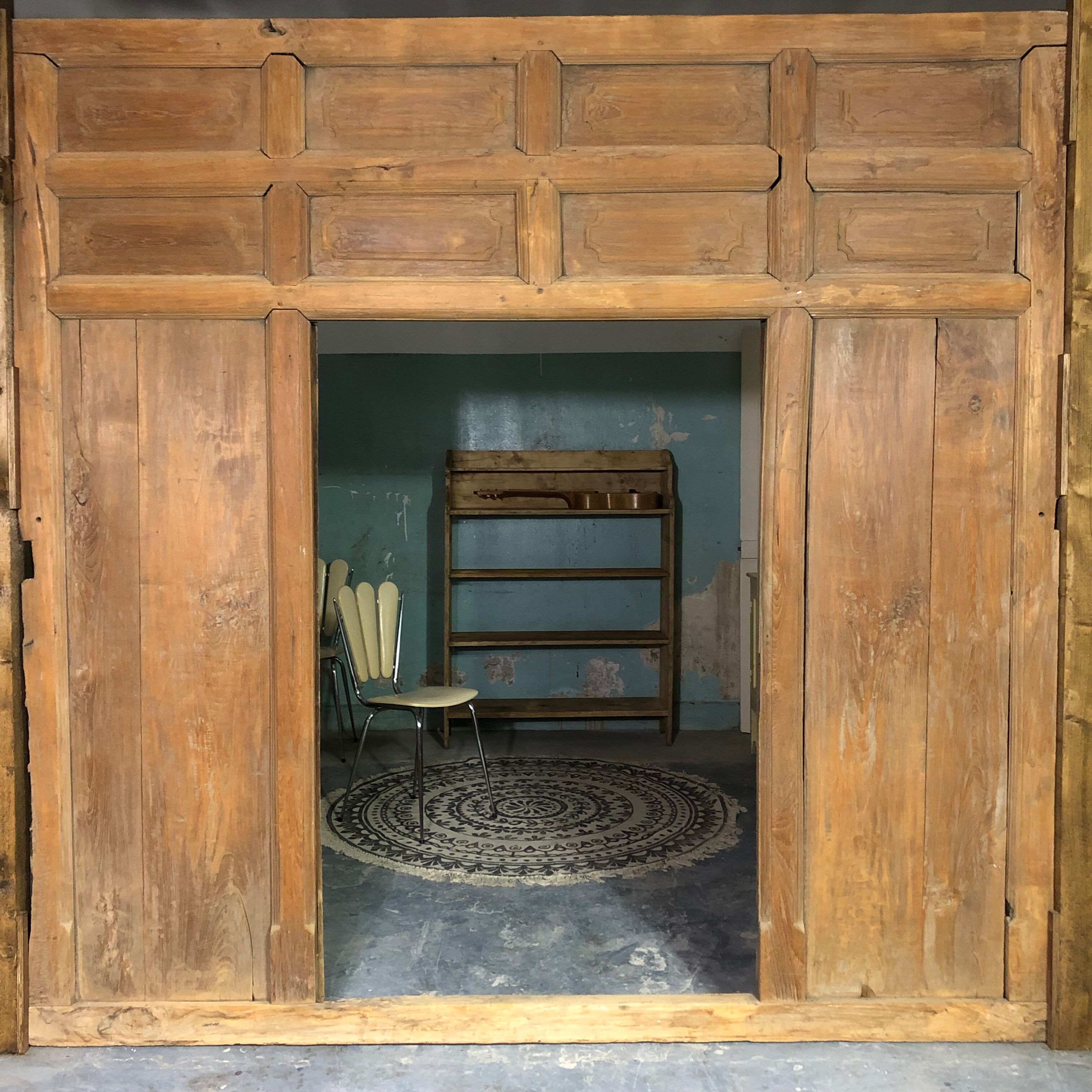 Old wooden door with its frame
