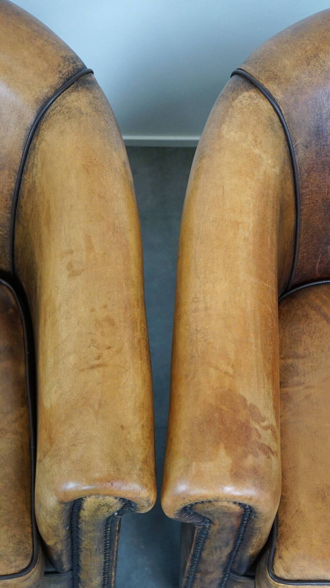 Set of 2 stylish yet beautiful and comfortable sheepskin club armchairs