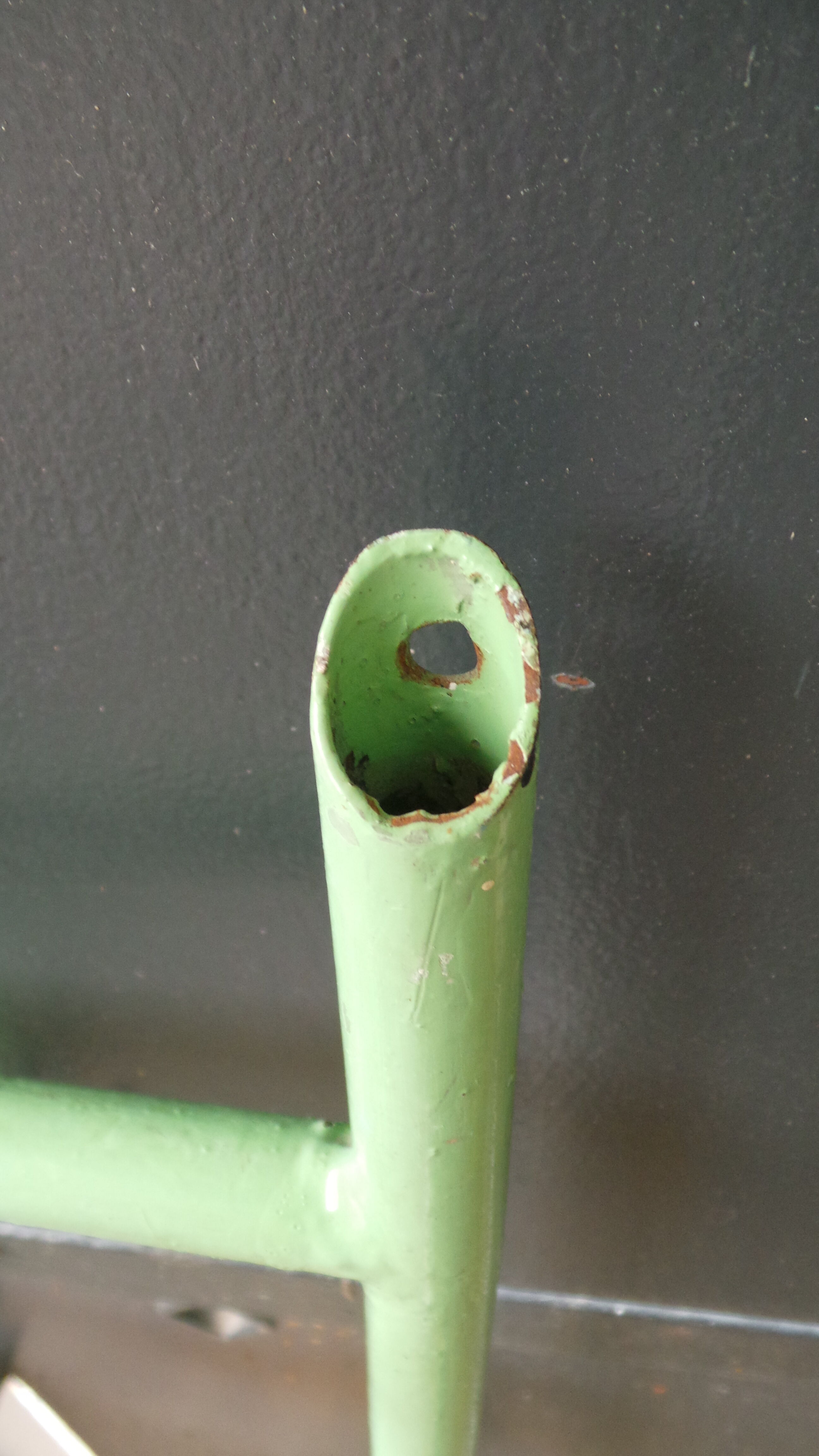 Coat rack green metal and its former mirror