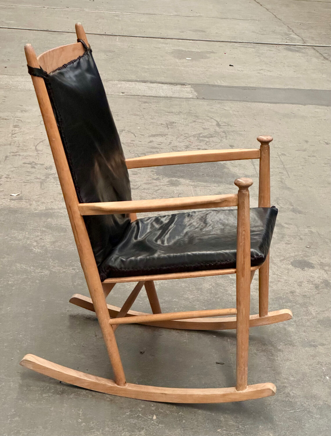 Scandinavian wooden and leather rocking chair