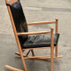 Scandinavian wooden and leather rocking chair