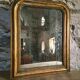 Antique French Louis Philippe mirror, gilded mercury mirror, 19th century.