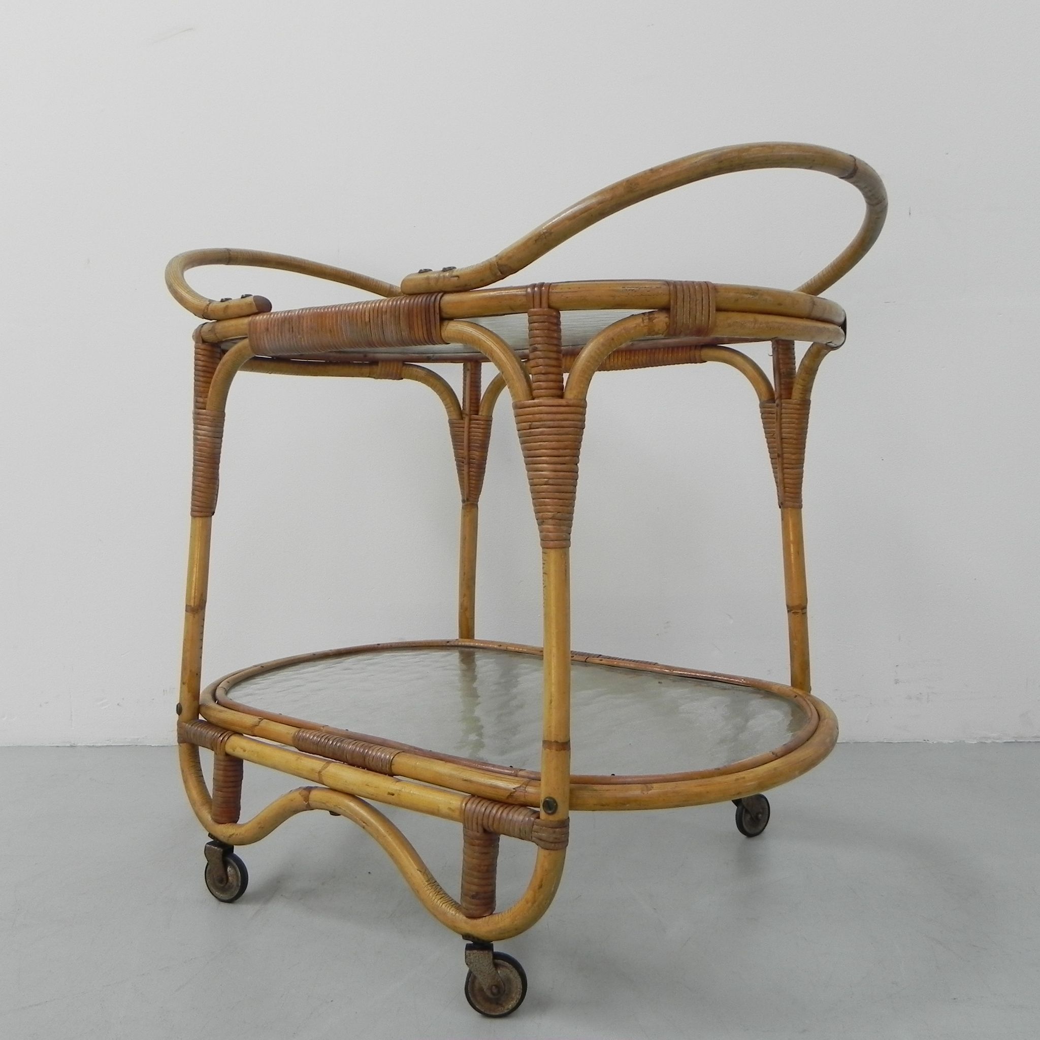 Bamboo, rattan serving trolley on castors