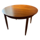 Scandinavian round teak table with butterfly extensions from the 60s