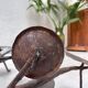 Wall lamp in wrought iron.