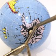 Globe piggy bank, 1950