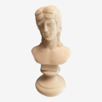 Bust on alabaster pedestal depicting Eros