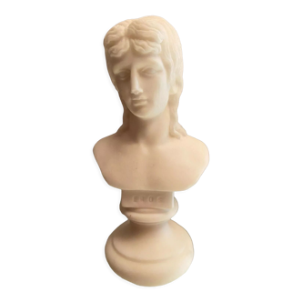 Bust on alabaster pedestal depicting Eros