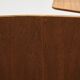 Teak chair with writing tablet