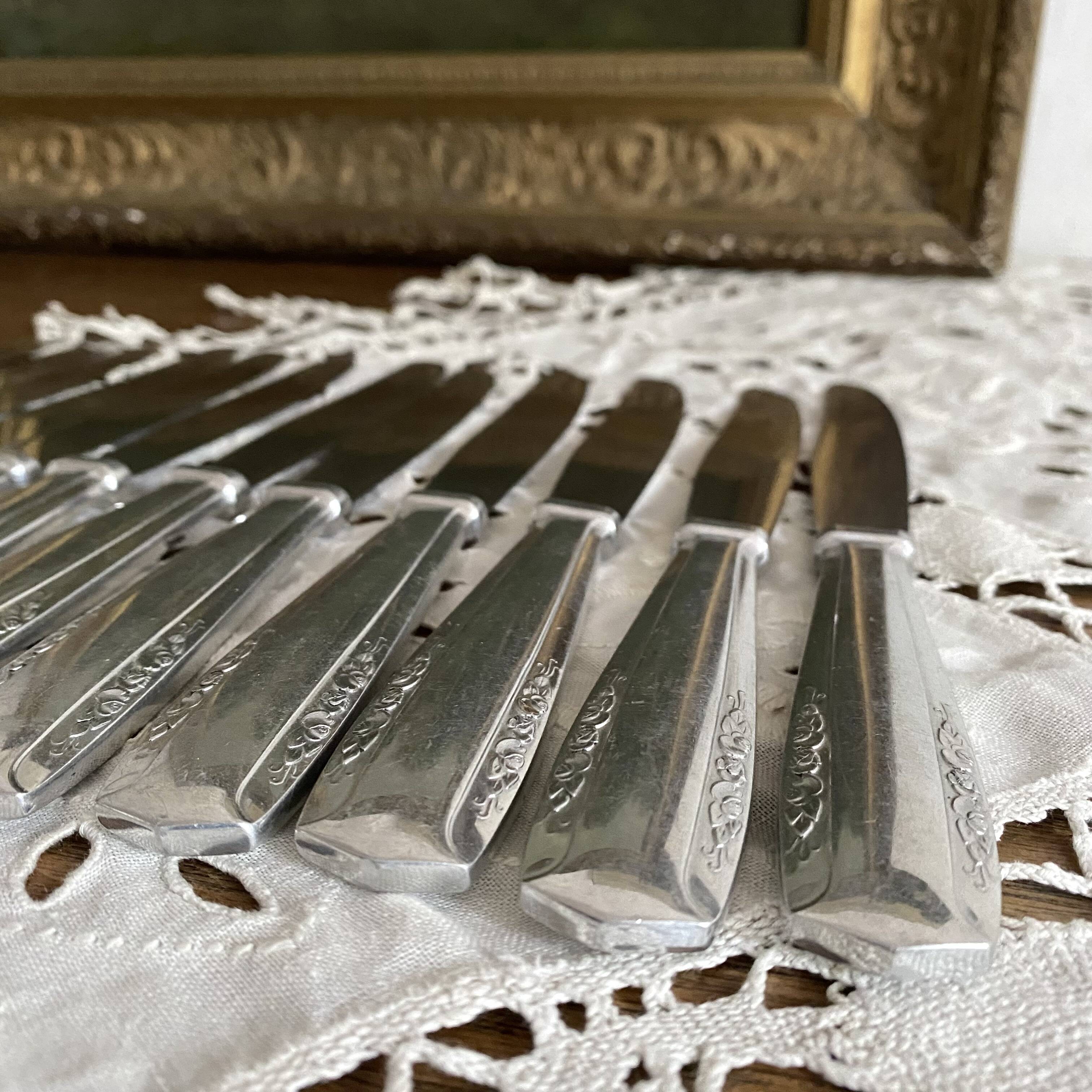 Silver-plated knives with stainless steel blades, Vego brand, 1950s