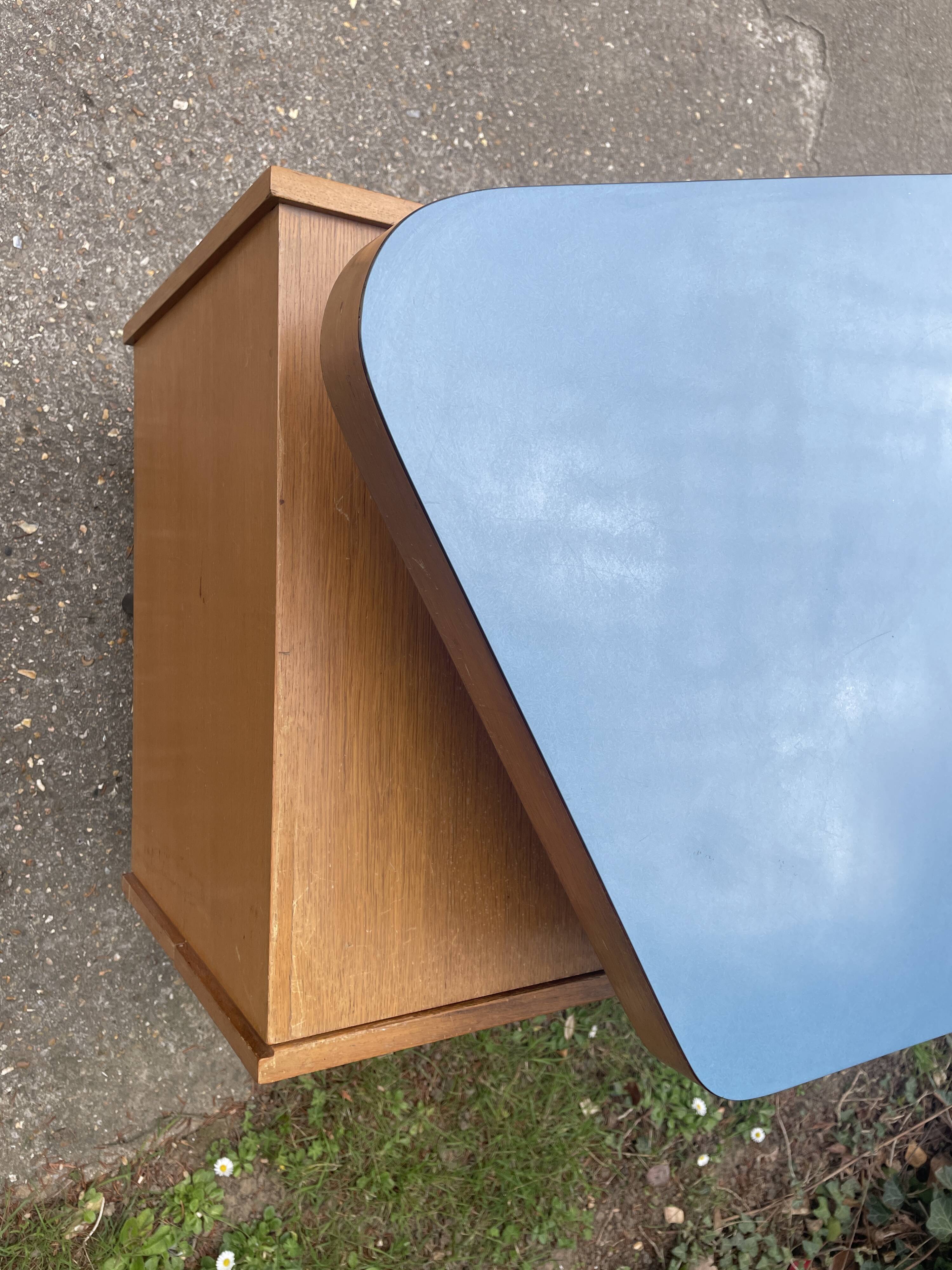 Asymmetrical desk by George Frydman