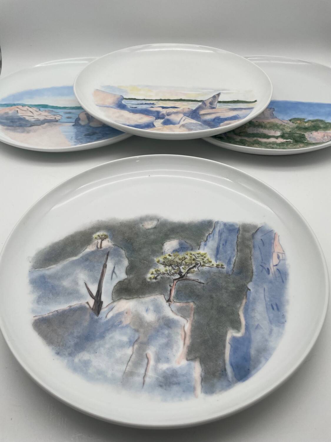 Hand painted porcelain plate with landscape decoration