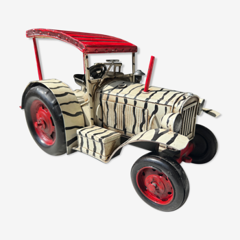 Old zebra metal tractor
