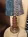 Table lamp in carved wood in the style of Charles Dudouyt.