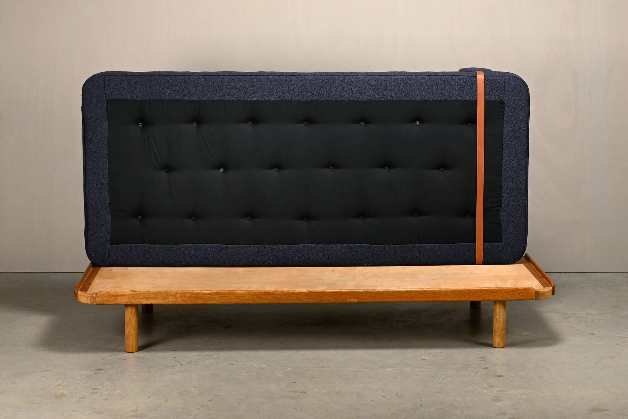 Scandinavian Daybed in Oak and dark Blue bouclé fabric with Leather accents