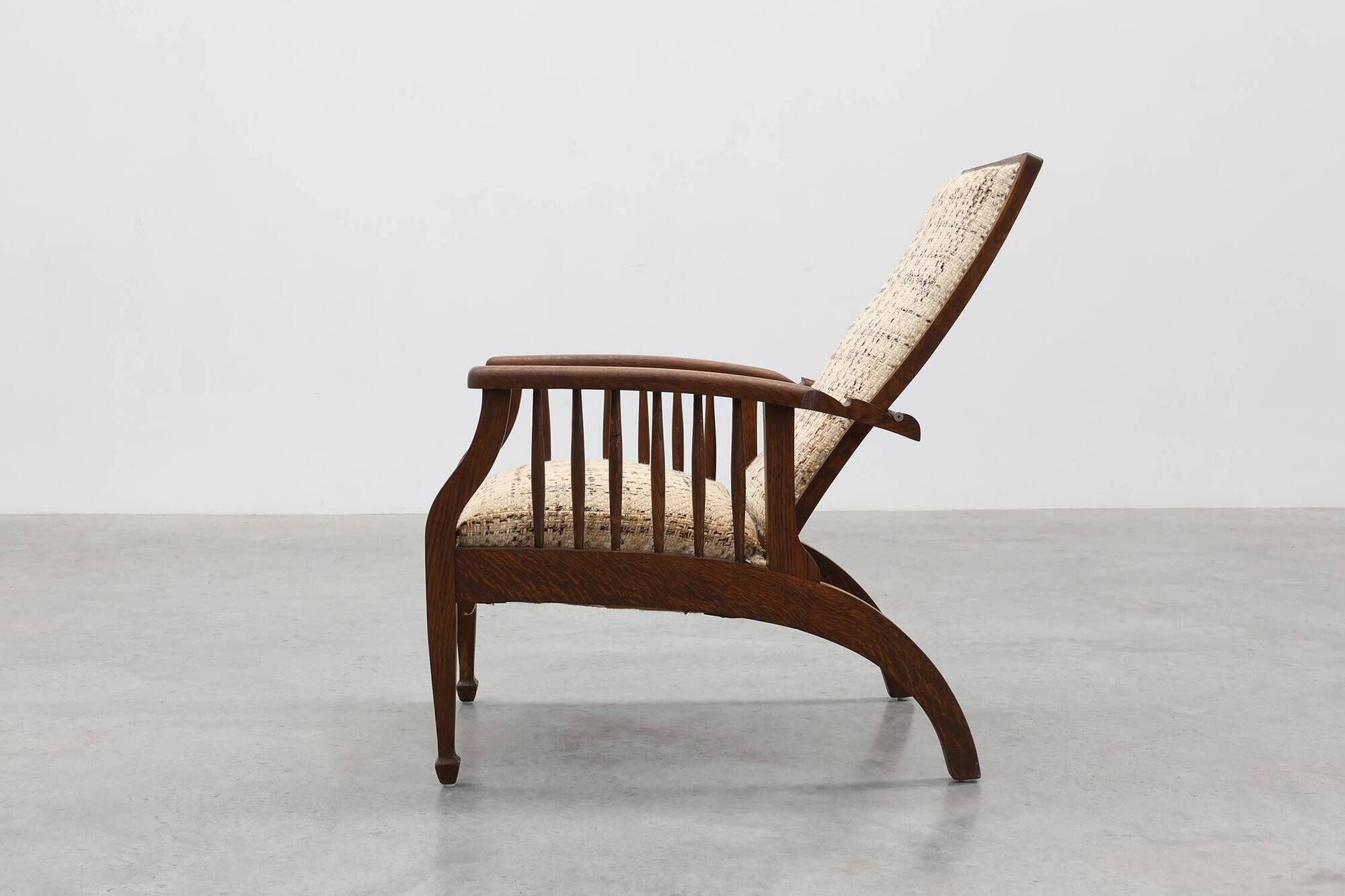 Arts & Craft oak armchair with spindle sides and tweed upholstery, Belgium