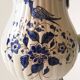 Moutiers earthenware jug, hand-painted blue decoration.