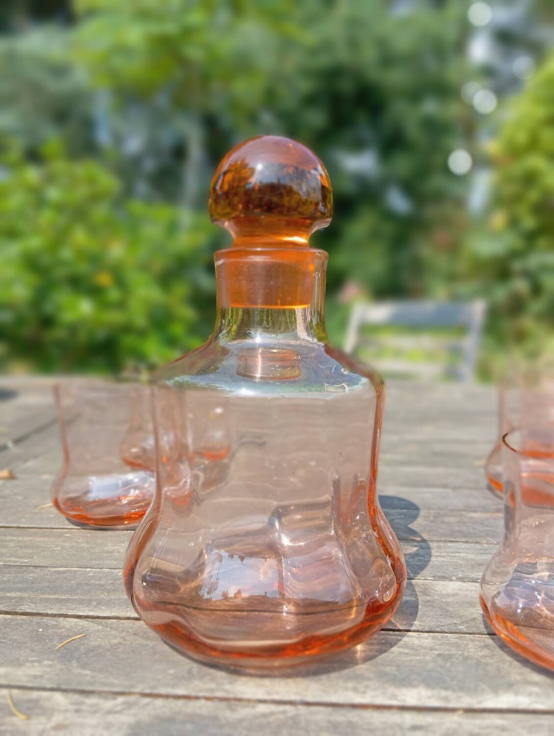 Retro whiskey set with pink glass, decanter and 5 glasses