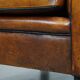 Sheep leather Art Deco design armchair finished with black piping