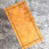 Vintage coffee table with gold-gilded legs and light brown wood veneer geometric inlaid top