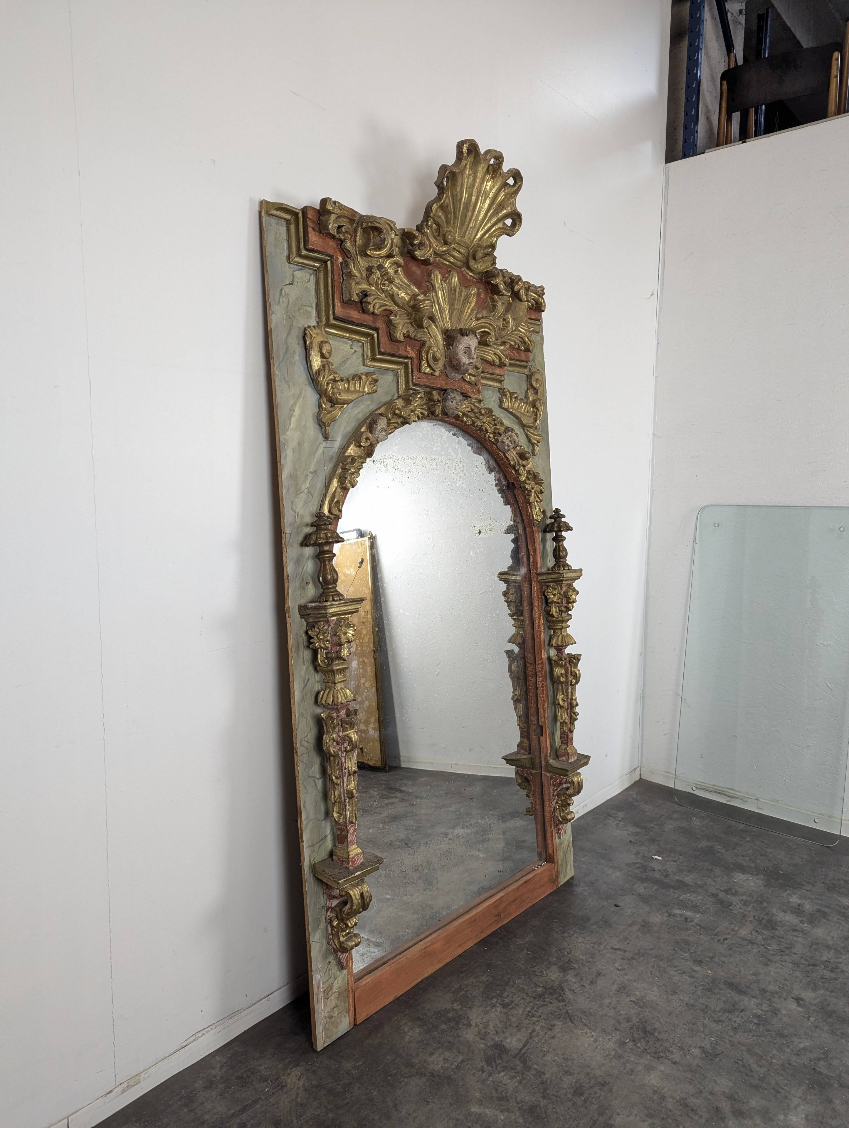 Large trumeau altarpiece composition of woodwork from the 18th century.