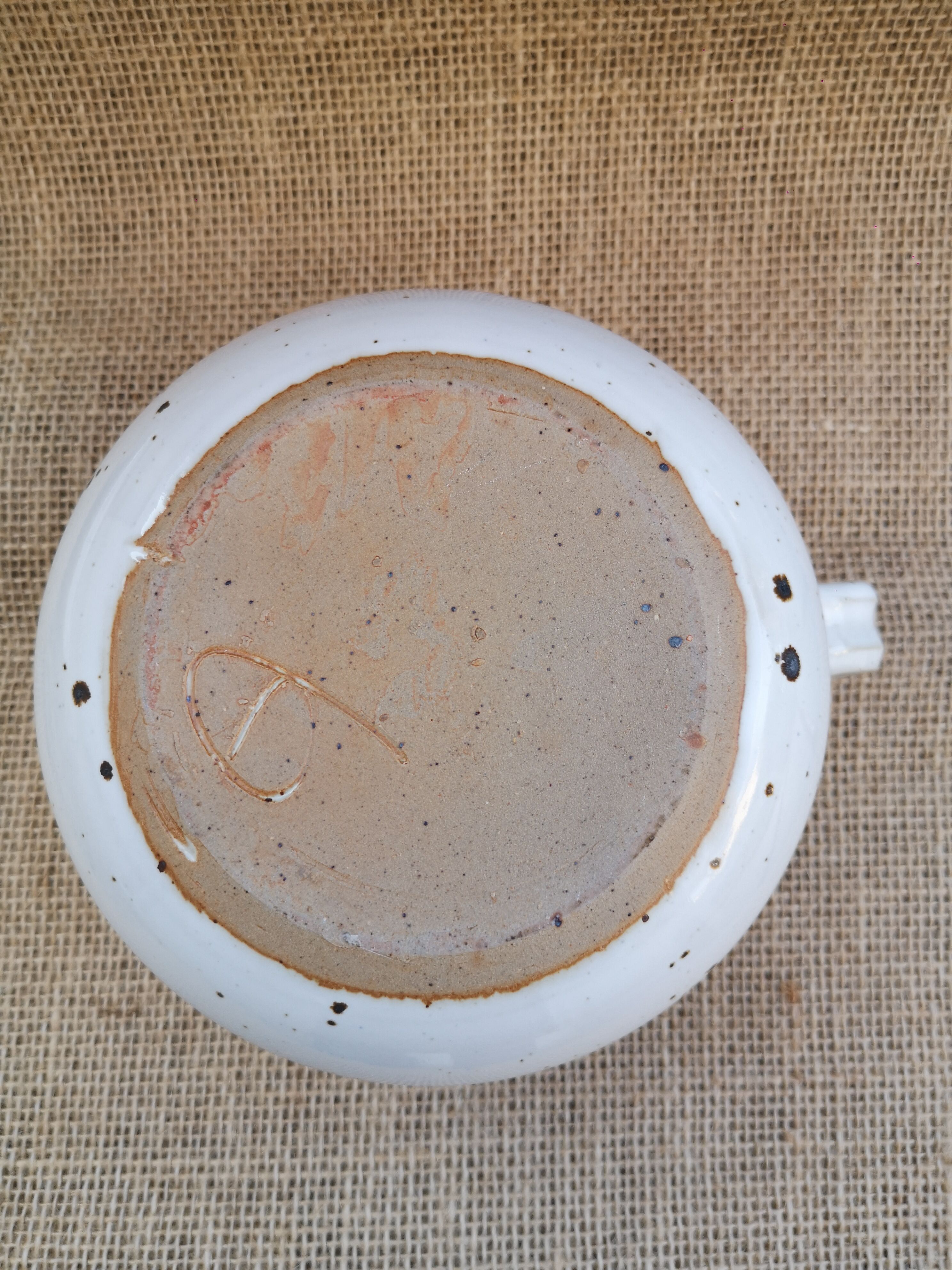 Pitcher in speckled sandstone