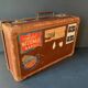Old travel suitcase and legendary stickers, 1920