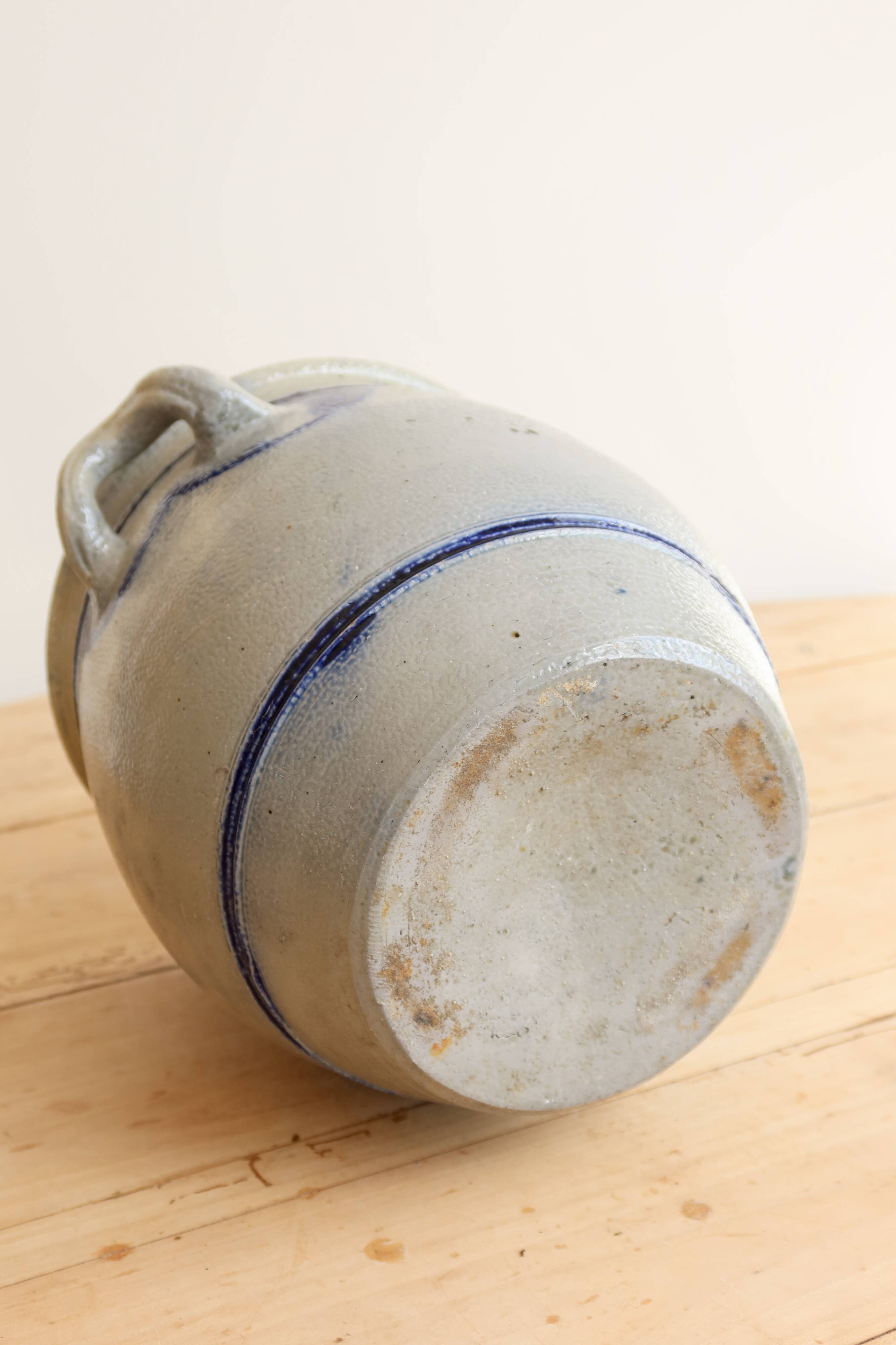 Old ceramic jar from Alsace with blue decoration.