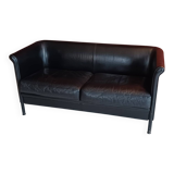 Black leather two-seater sofa
