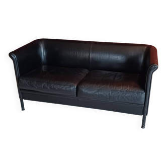 Black leather two-seater sofa