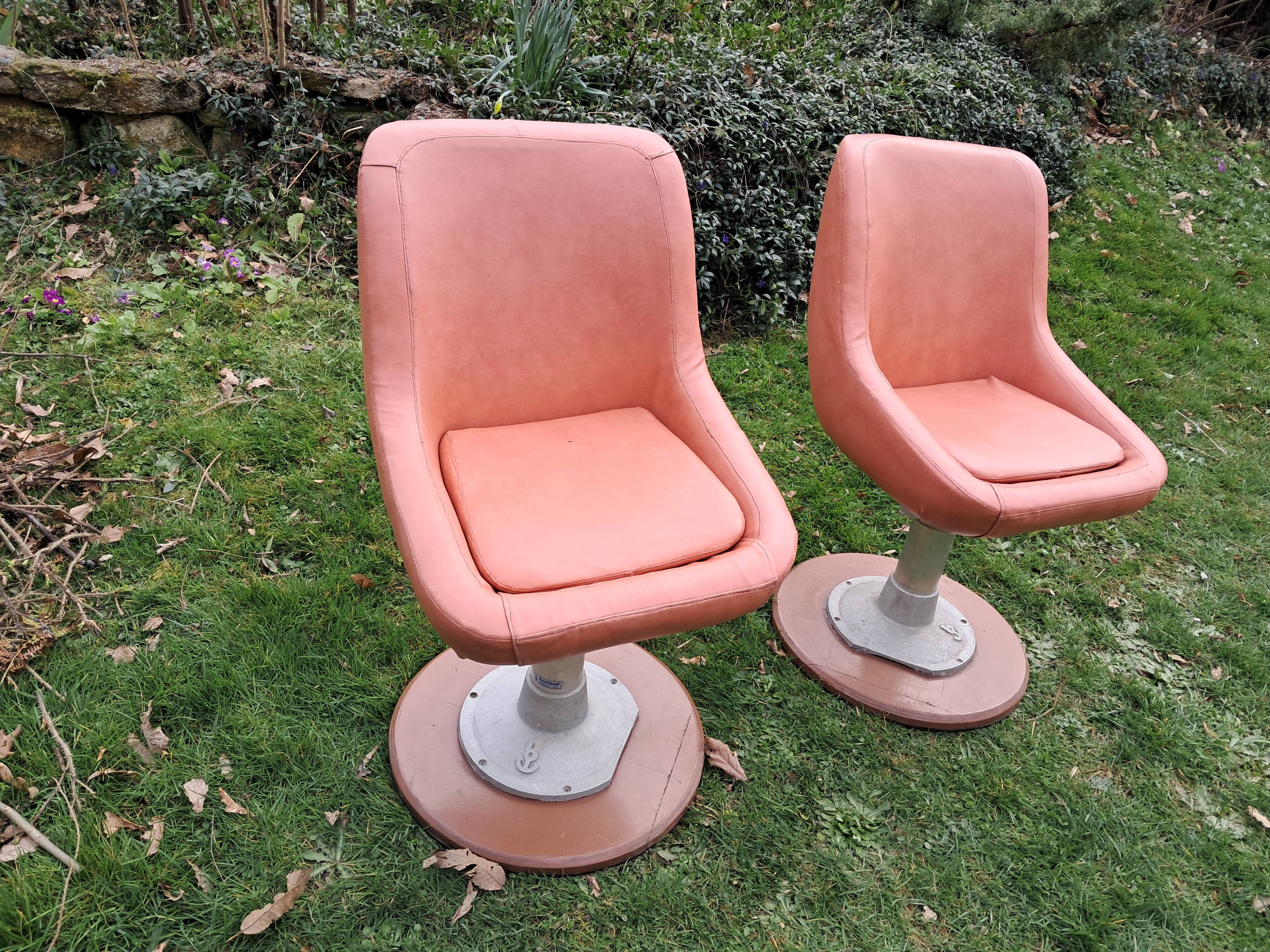 Original armchair on a cast iron base.