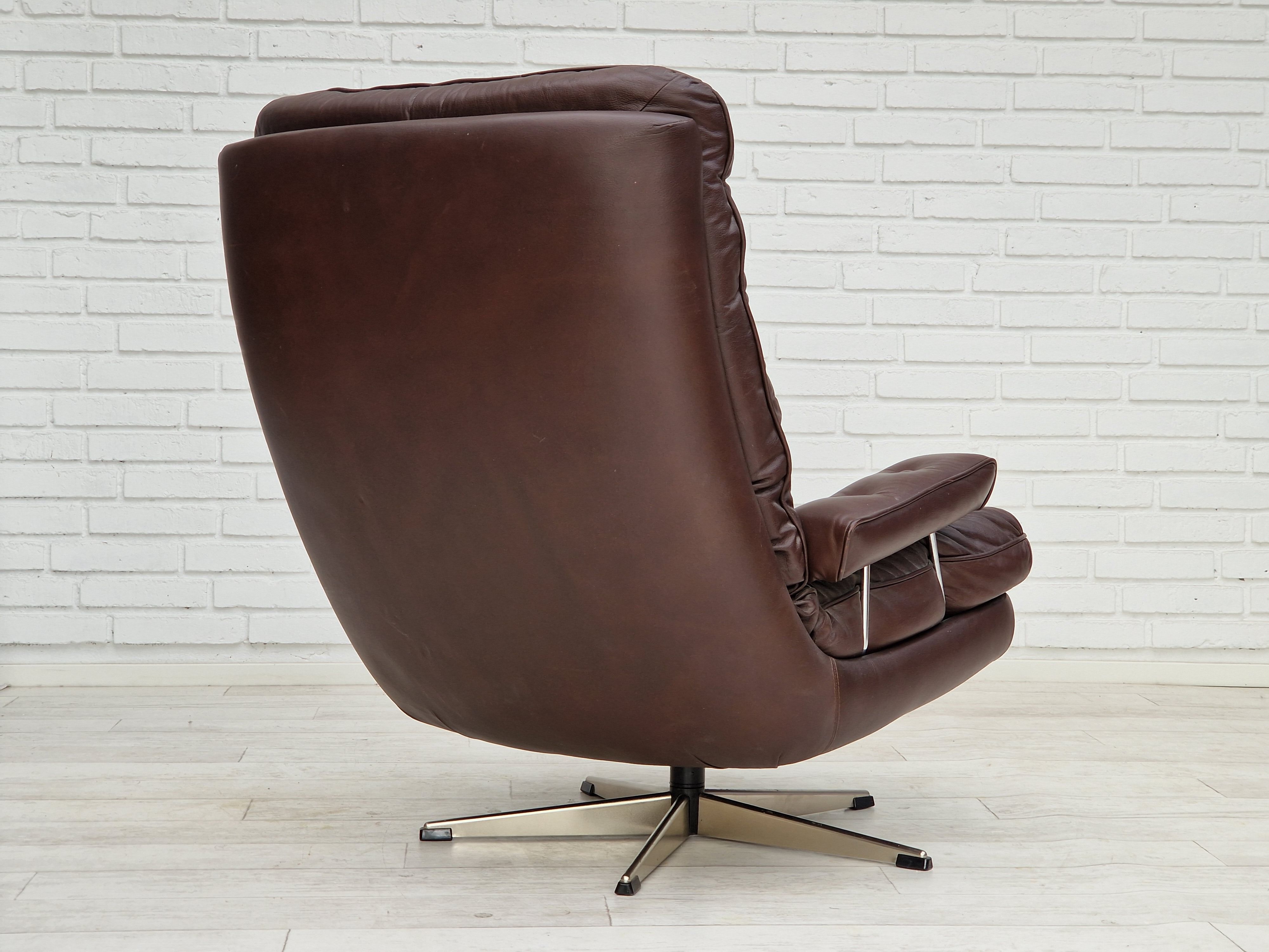 Vintage danish swivel leather armchair 1970s