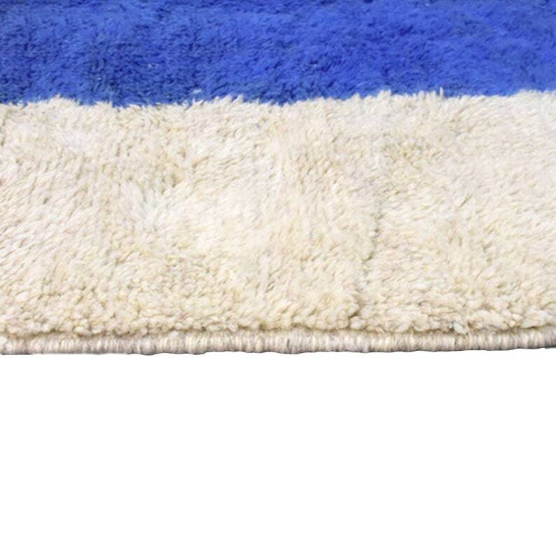 Handmade pure wool rug in blue and white, size 150/250 cm.