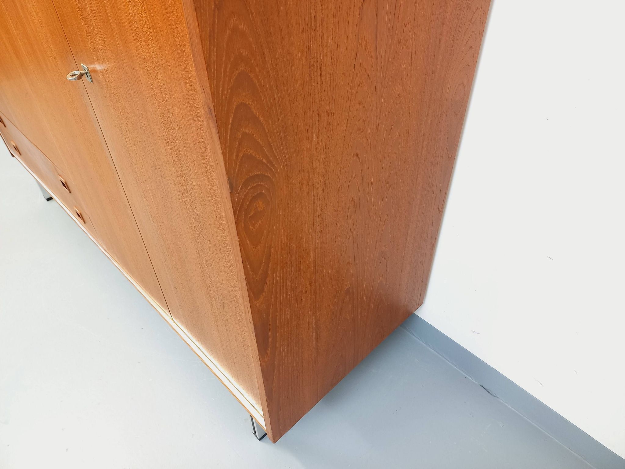 Vintage Scandinavian modernist wardrobe in teak and metal from the 1960s.