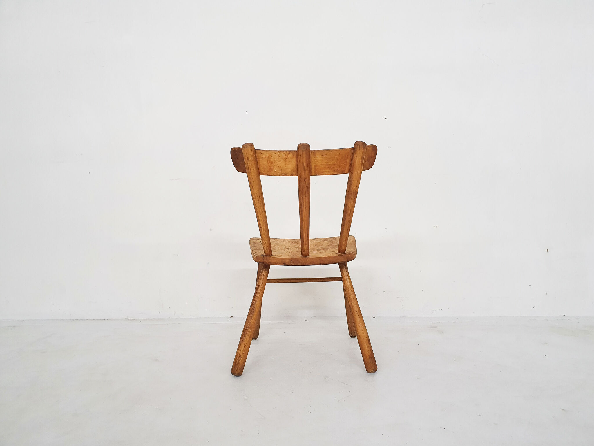 Scandinavian birchwood spindle back chair in the style of Ingvar Hildingson, Sweden 1950's