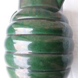 Green ceramic pitcher