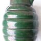 Green ceramic pitcher