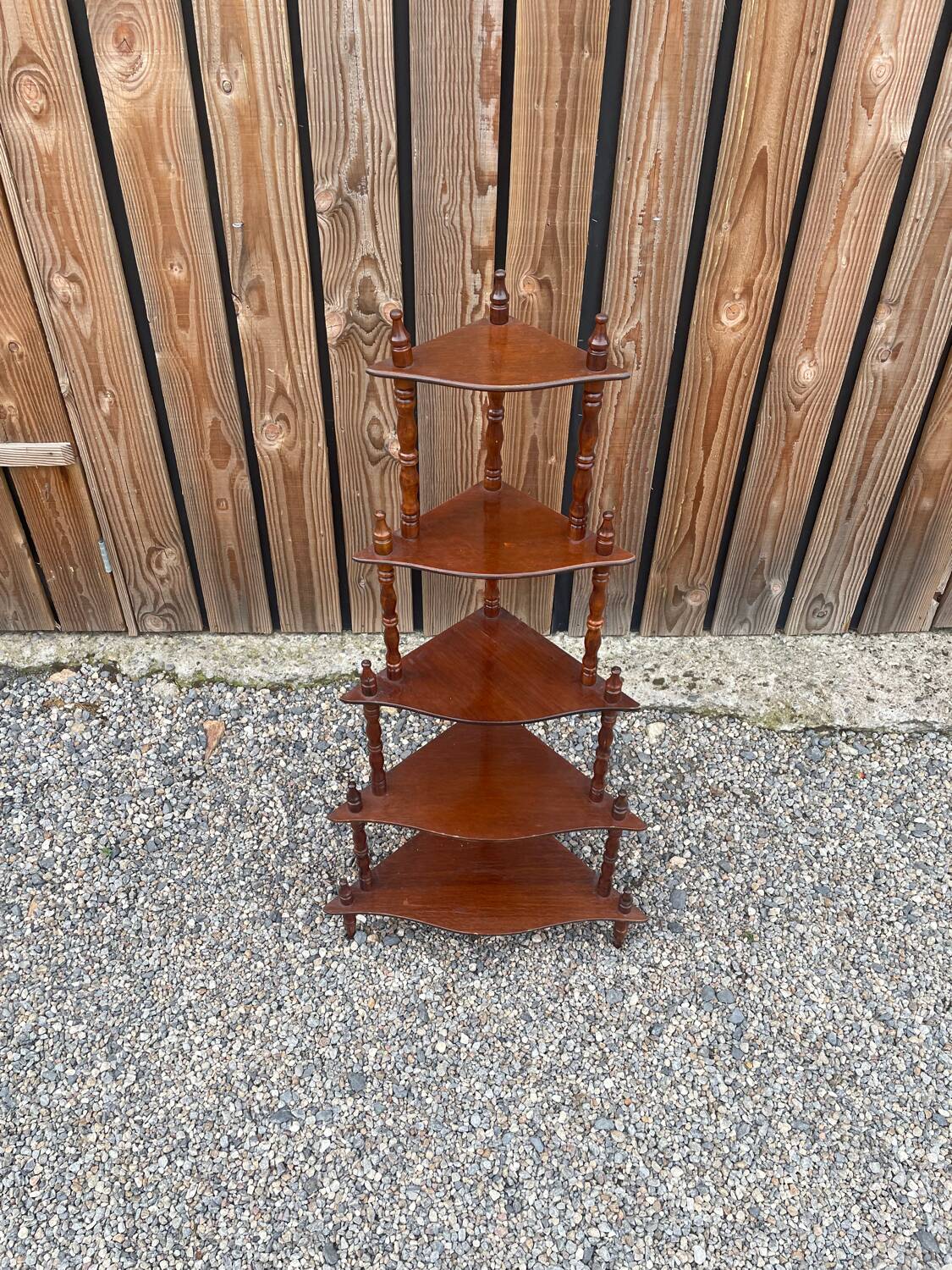 Wooden corner shelf on legs with 5 shelves