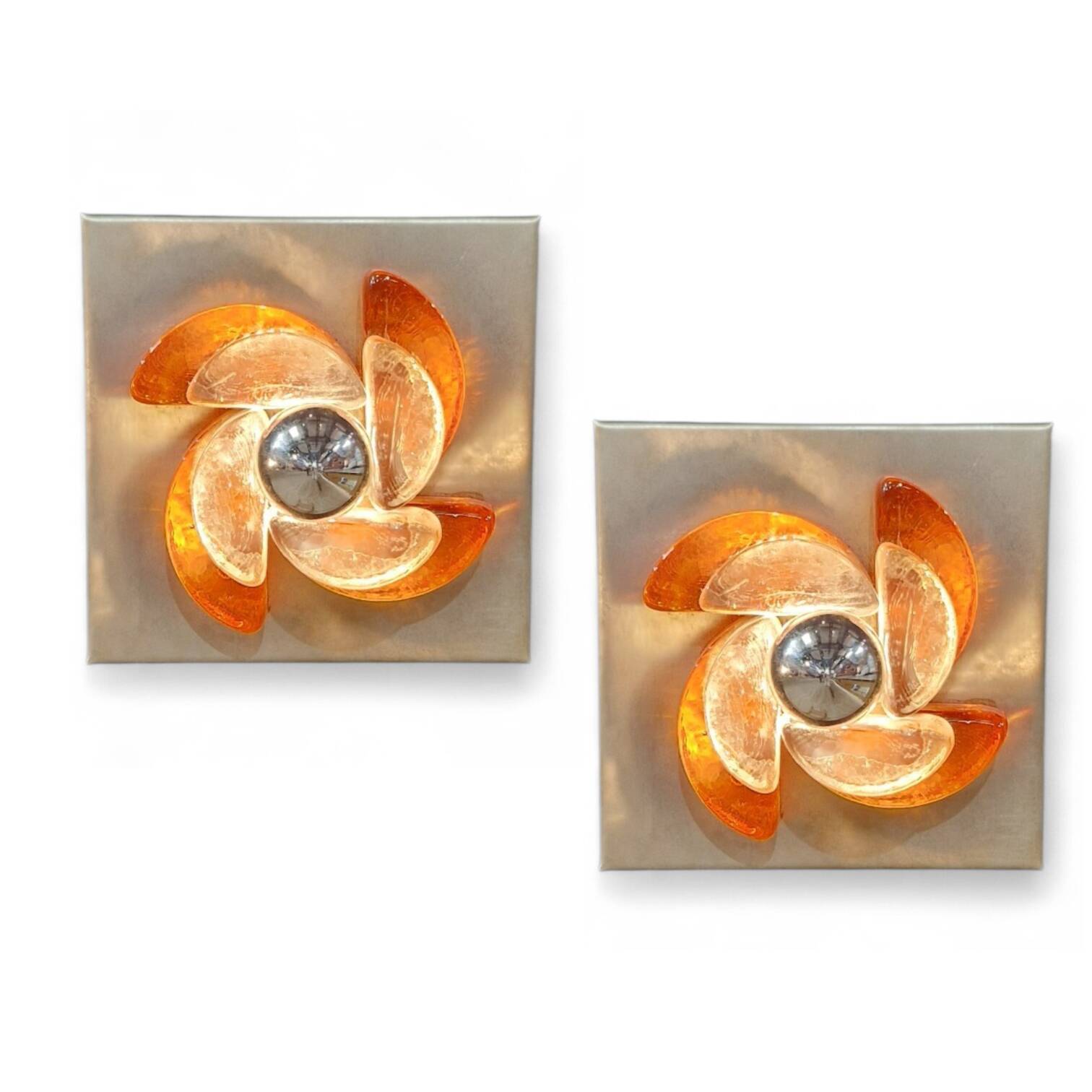 Pair of sculptural wall lights in moulded glass and metal
